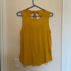 Tank top with cute cut out and tie in the back